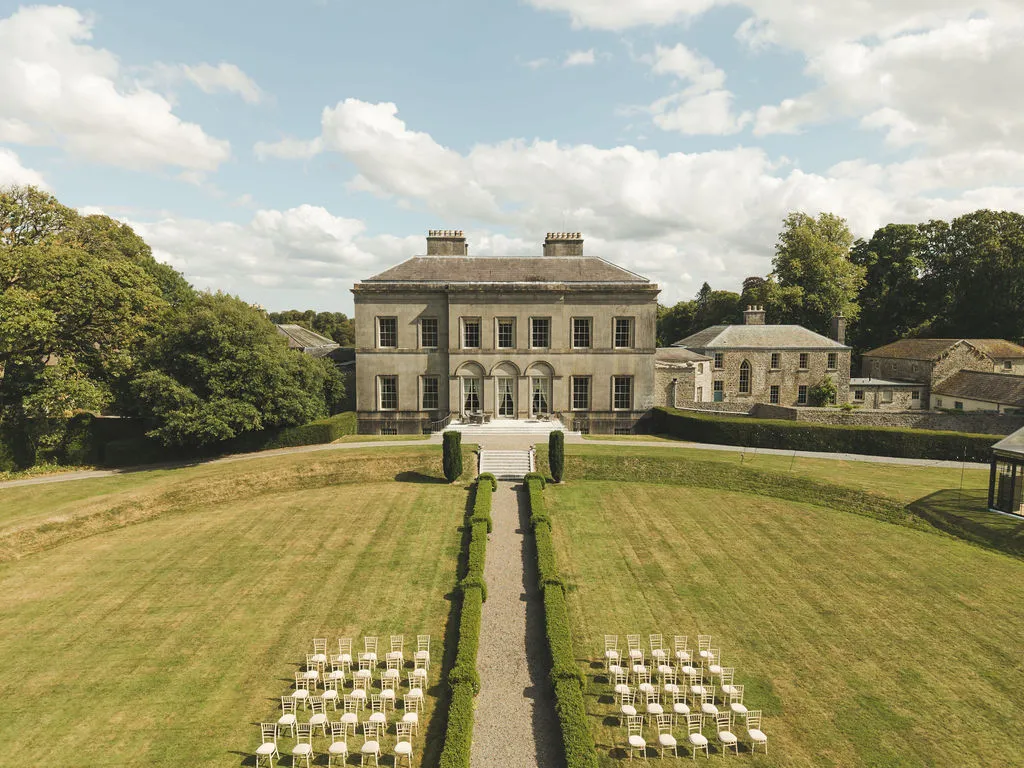 Ceremony on the front lawn facing the Manor House