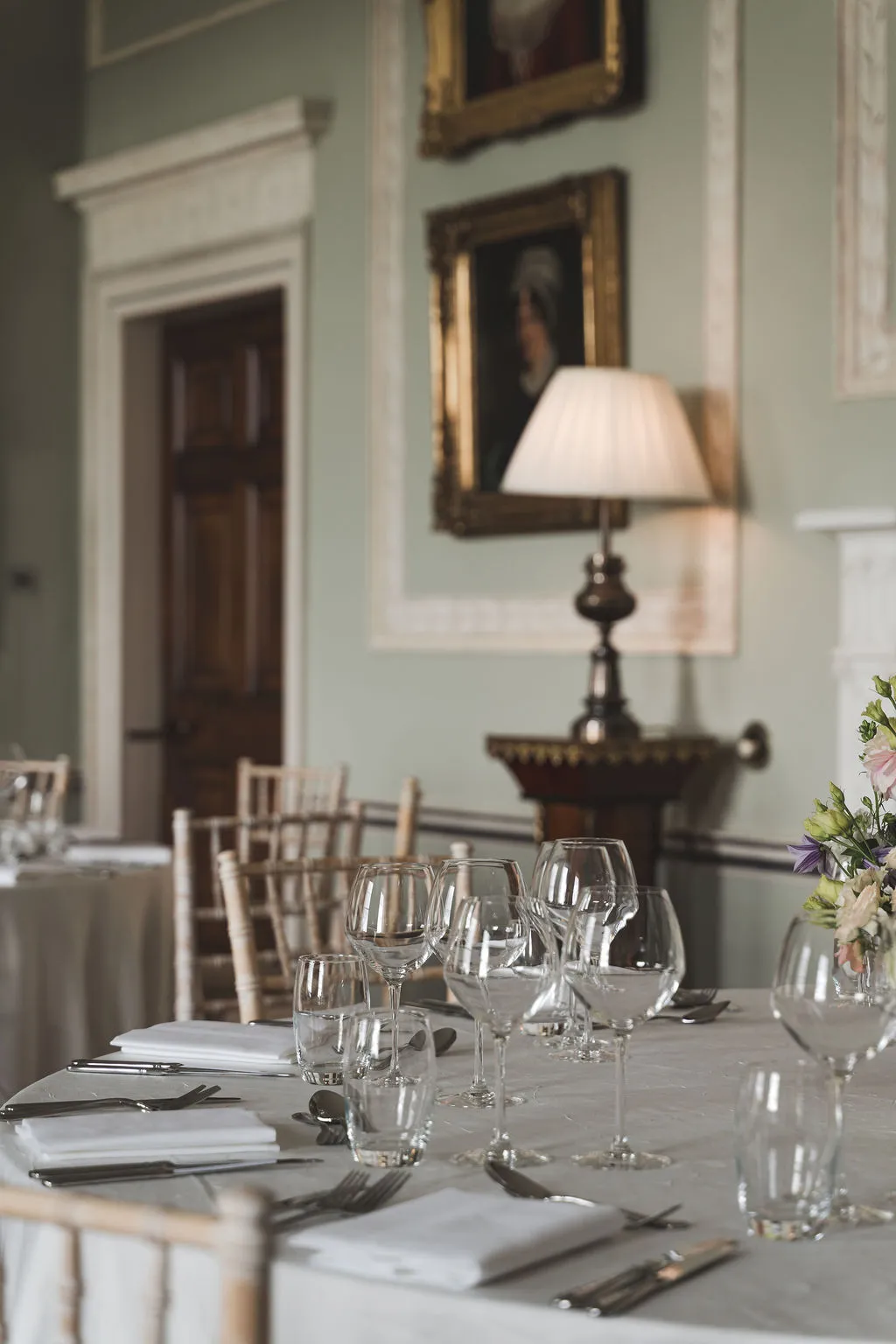A wedding table setting with glassware and linen