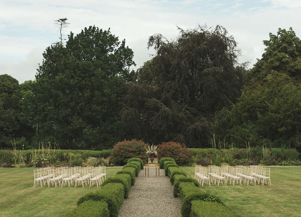 Rows of ceremony chairs laid out in the walled garden at Ardbraccan Estate