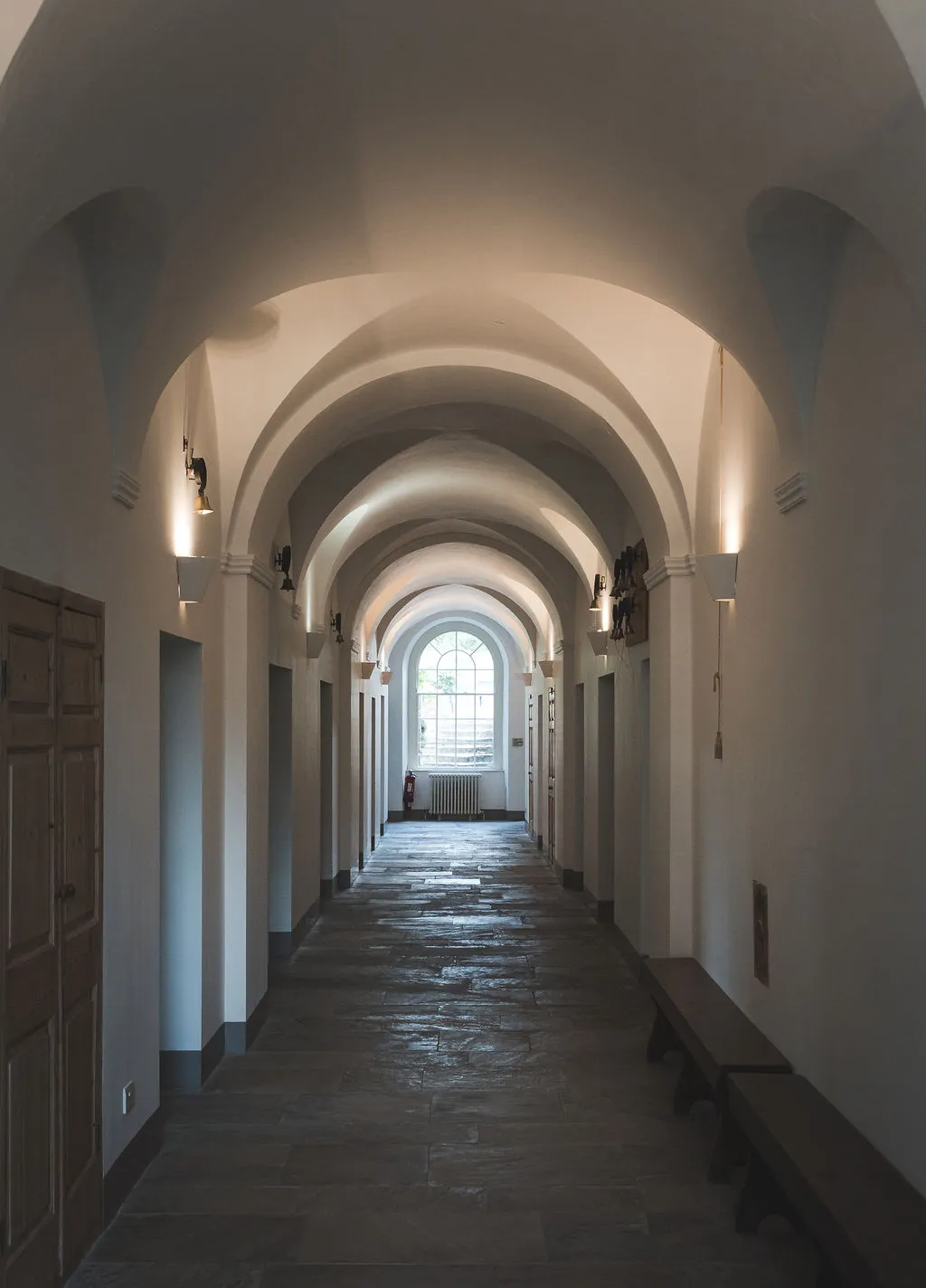 The vaulted stone corridor